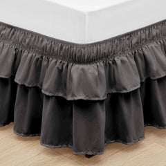 Wrap around elastic bed skirt with modern dust ruffle design for multiple bed sizes