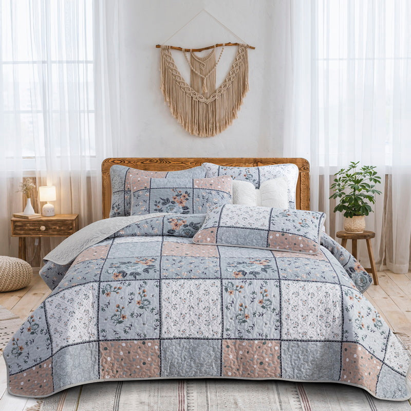 Boho style quilt bedspread set with pastel botanical prints and four pillow shams