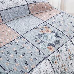 Boho style quilt bedspread set with pastel botanical prints and four pillow shams