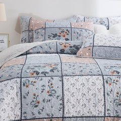 Boho style quilt bedspread set with pastel botanical prints and four pillow shams