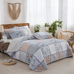 Boho style quilt bedspread set with pastel botanical prints and four pillow shams