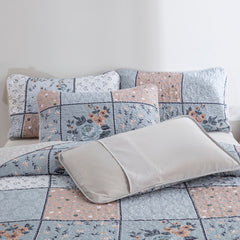 Boho style quilt bedspread set with pastel botanical prints and four pillow shams