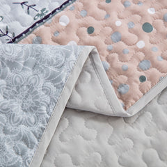 Boho style quilt bedspread set with pastel botanical prints and four pillow shams