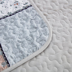 Boho style quilt bedspread set with pastel botanical prints and four pillow shams