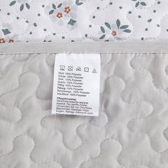 Boho style quilt bedspread set with pastel botanical prints and four pillow shams