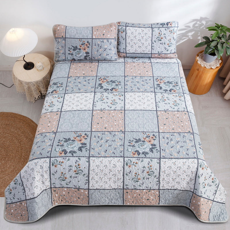 Boho style quilt bedspread set with pastel botanical prints and four pillow shams