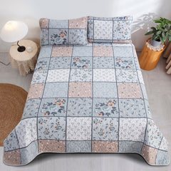 Boho style quilt bedspread set with pastel botanical prints and four pillow shams