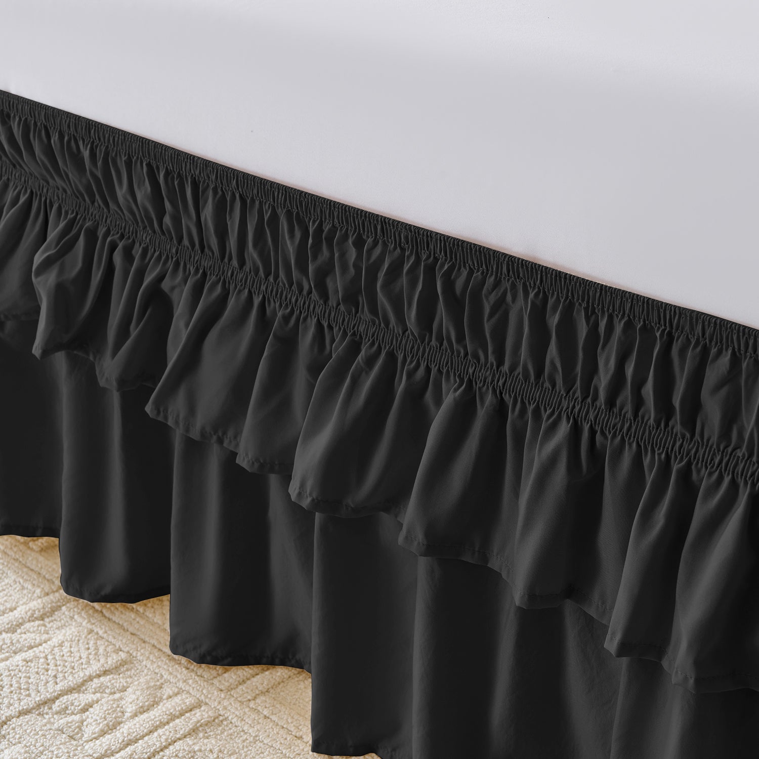 Wrap around elastic bed skirt with modern dust ruffle design for multiple bed sizes